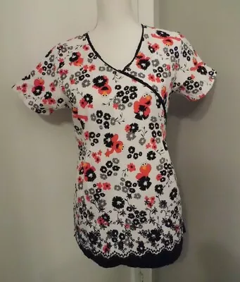 Women's Size XS Sesame Street Elmo White Red Black Floral Scrub Top • $12.99