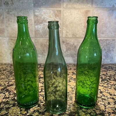 Vintage Lot Of Two Clicquot Club Green Soda Bottles And One Plain Bottle. • $12.99