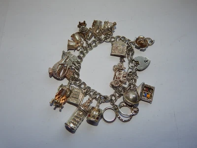 £39.99 • Buy NICE VINTAGE BIRM H/M SILVER CHARM BRACELET WITH SOME UNUSUAL CHARMS 68.9 Gm