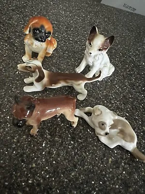 Five Vintage Dog And One Cat Figurine • $10