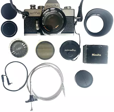 EXCELLENT MINOLTA SRT 101 35mm FILM CAMERA WITH ROKKOR 50mm LENS FILTERS & MORE • $99.99