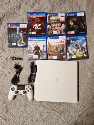 $280 • Buy Sony PlayStation 4 Slim 500GB White Console Plus 7 Games