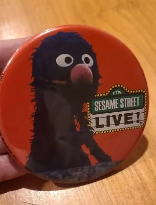 Vintage 1985 SESAME STREET LIVE Metal Button Pin Muppets Grover Pinback 3.5 Inch • $13