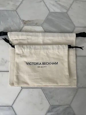 NEW TWO VICTORIA BECKHAM DRAWSTRING BEAUTY BAGS- Ivory/Black Lettering • $9.99