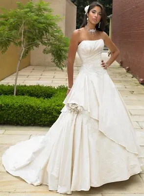 Maggie Sottero Designer Wedding Dress. Symphony Royal (12) Preowned. Preserved. • $600
