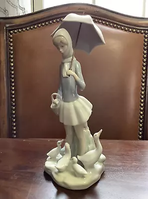 Lladro Girl With Umbrella  Basket And Four Geese Retired Porcelain Figurine 4510 • $69