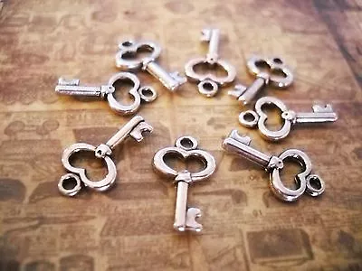 10 Silver Key Charms Antique Silver Tone Steampunk Supplies Miniatures 15mm • $2.98