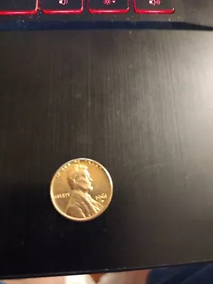 1961-D 1C RD Lincoln Cent • $1.80