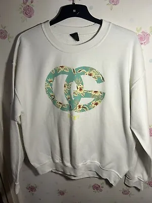 Obey Cream With Floral Detail Size L • £10