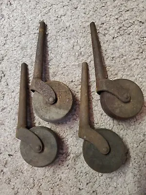 4 Vintage Wood And Metal Casters • $22