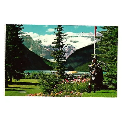 Vintage Postcard Canadian Rockies Lake Louise Highland Bagpipes Mountain Garden • $10