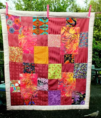 BEAUTIFUL BRIGHT COLOURFUL PINK/MAUVE/MULTI COT SIZE  PATCHWORK QUILT. 79x92cms • £12