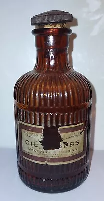 McKesson Robbins Oil Of? Paper Label Amber Medicine Bottle With Branded Closure  • $9