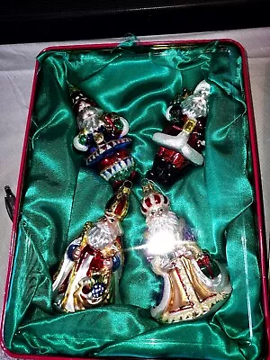 The Brass Key Presents Christmas Treasures Set Of 4 Santa's. • $22.99