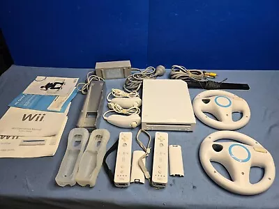 Nintendo Wii Console - 2 Controllers And Numchucks And 2 Mario Kart Wheels • $69.95