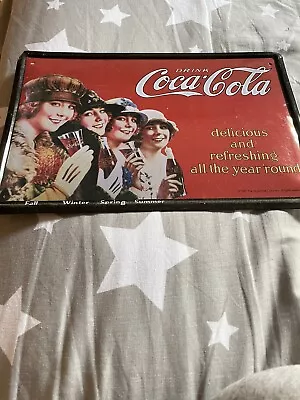 Coca Cola • £1.20