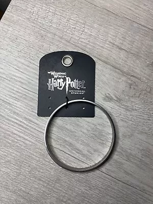 Harry Potter Silver Bangle W/Hogwarts Motto  Draco Dormiens Nunquam Titillandus  • $20