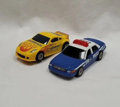 £10 • Buy Micro Scalextric Cars - Nissan & Police Car