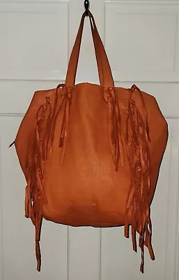 MONSERAT DE LUCCA Orange Leather Fringe Hobo Shoulder Bag Purse. ANTHROPOLOGIE  • $69.99