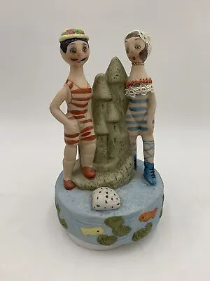 Vintage Porcelain Figurine MSR Imports Music Box Organ Grinder Swimmer Beach #I • $36.99