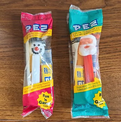 Vintage PEZ Dispensers Lot Of 2 Christmas  Santa & One Snowman W/feet Unopened  • $1