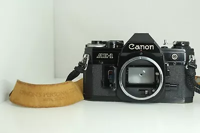 Canon AE-1 P Program Black 35mm SLR Film Camera Body With Strap 928.25 • £85