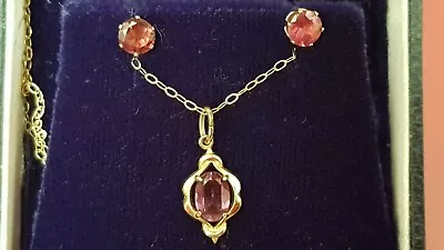 14ct GOLD AMETHYST PENDANT ON 9ct CHAIN WITH MATCHING EARRINGS.  • £25