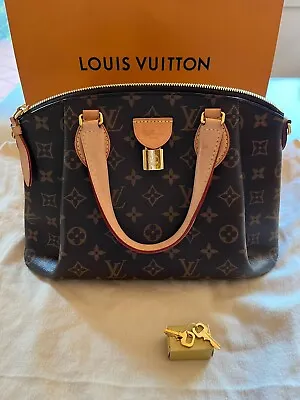 $1700 • Buy Louis Vuitton Rivoli PM Monogram Handbag