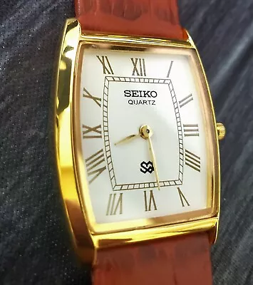 Rare Seiko Men Gold Barrel Tank White Roman Dial Brown Leather Band Dress Watch • $77.99