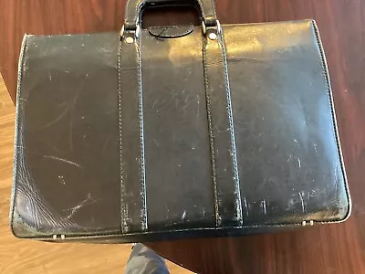 Older Used Black Lether ￼ Briefcase ￼ • $30