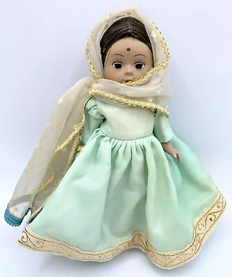 (b) Madame Alexander 8  Doll International India 575 • $4.99