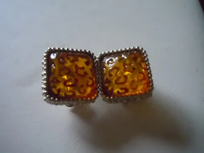 Vintage Amber Colored Mottled Lucite Clip On Earrings • $7