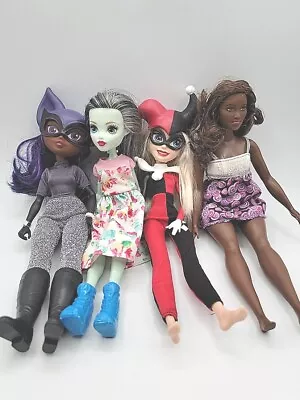 Lot Of 4 Random Dolls Monster High Barbie Super Hero With Clothing  • $15.90