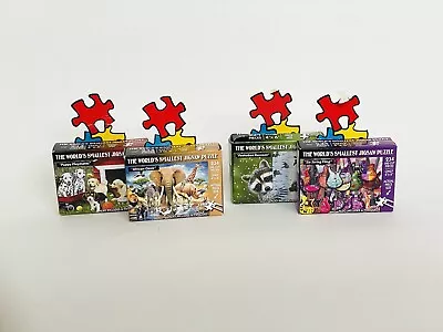 4 TDC World's Smallest Jigsaw Puzzle Puppy Raccoon Africa Strings- 4 X 6  • $49