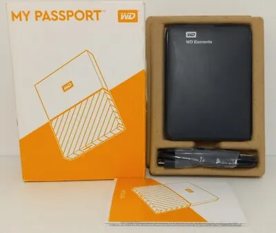 WD My Passport Portable 1TB Hard Drive WDBYNN0010BBK-0B W/ USB Adapter • $49.99