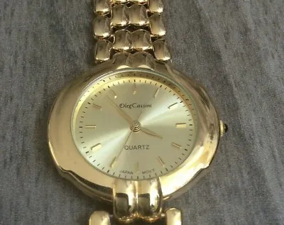 Oleg Cassini Men's Watch Round Gold Dial On A Gold Linked Band New/Vintage Item! • $29.99