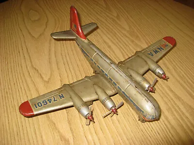 ALPS NWA B377 Stratocruiser Northwest Airlines Tin Toy Airplane Japan Friction • $79.99