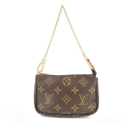 Auth Louis Vuitton Monogram Mini Pochette Accessoires Pouch Brown M58009 • $573.30