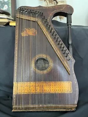 ANTIQUE MANDOLIN GUITAR HARP  THE HOME EDUCATIONAL CO.  21  X 12  • $70