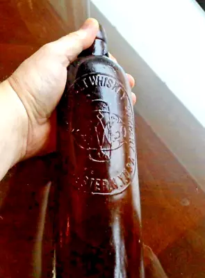 Antique Amber Embossed  The Duffy Malt Whiskey Co.   Pat Aug 24 - 10 3/8  Tall • $35