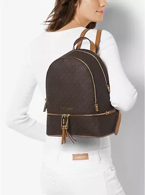 Michael Kors  Rhea  Signature Zip Backpack  Medium Size Brown EUC • $109