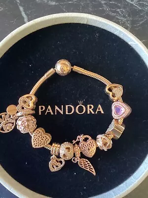 Pandora Rose Gold Charm Bracelet  • $250