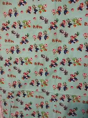 Nintendo Fabric Mario Adventures Springs Creative Teal 1.5 Yards Teal Mushroom • $19.99