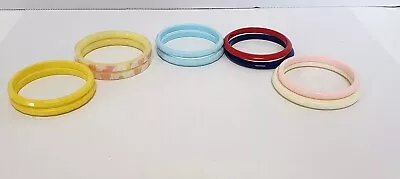 Vintage Plastic Bangle Bracelets Lot  10 Yellow Blue Blue Round Textured Edges  • $8