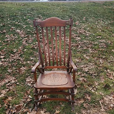 Antique Oak Pressed Back Brass Hardware Rocking Chair  • $325