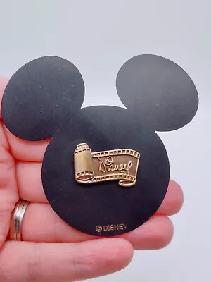 $14.39 • Buy Vtg Disney Signature Film Strip Movie Scroll Bronze Tone Brooch Lapel Pin 1990s