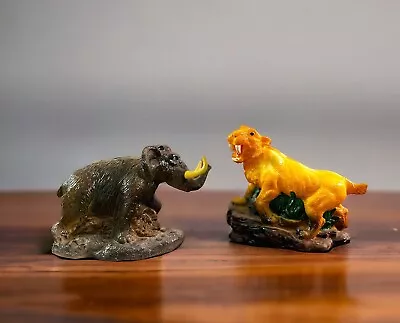 Vintage World Importing Saber Tooth Tiger And Mammoth  Coin Bank Set • $38