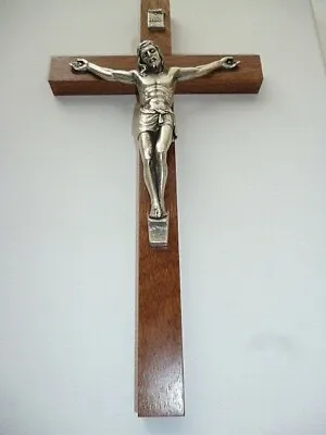 WOOD WALL CRUCIFIX     10     Mahogany • £24.95