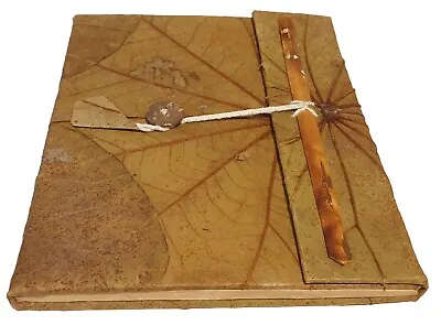 A6 Leaf Wrapped Handmade Notebook From Lokta Paper  • £13.95