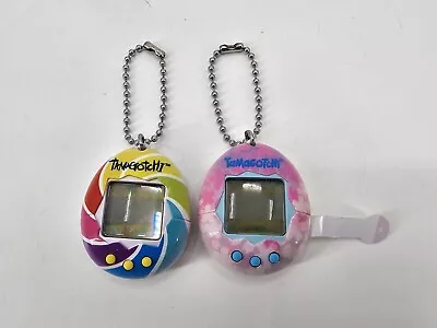 Lot Of 2 Bandai Tamagotchi Rainbow CANDY SWIRL Virtual Reality Pet 2017 & 2019 • $25